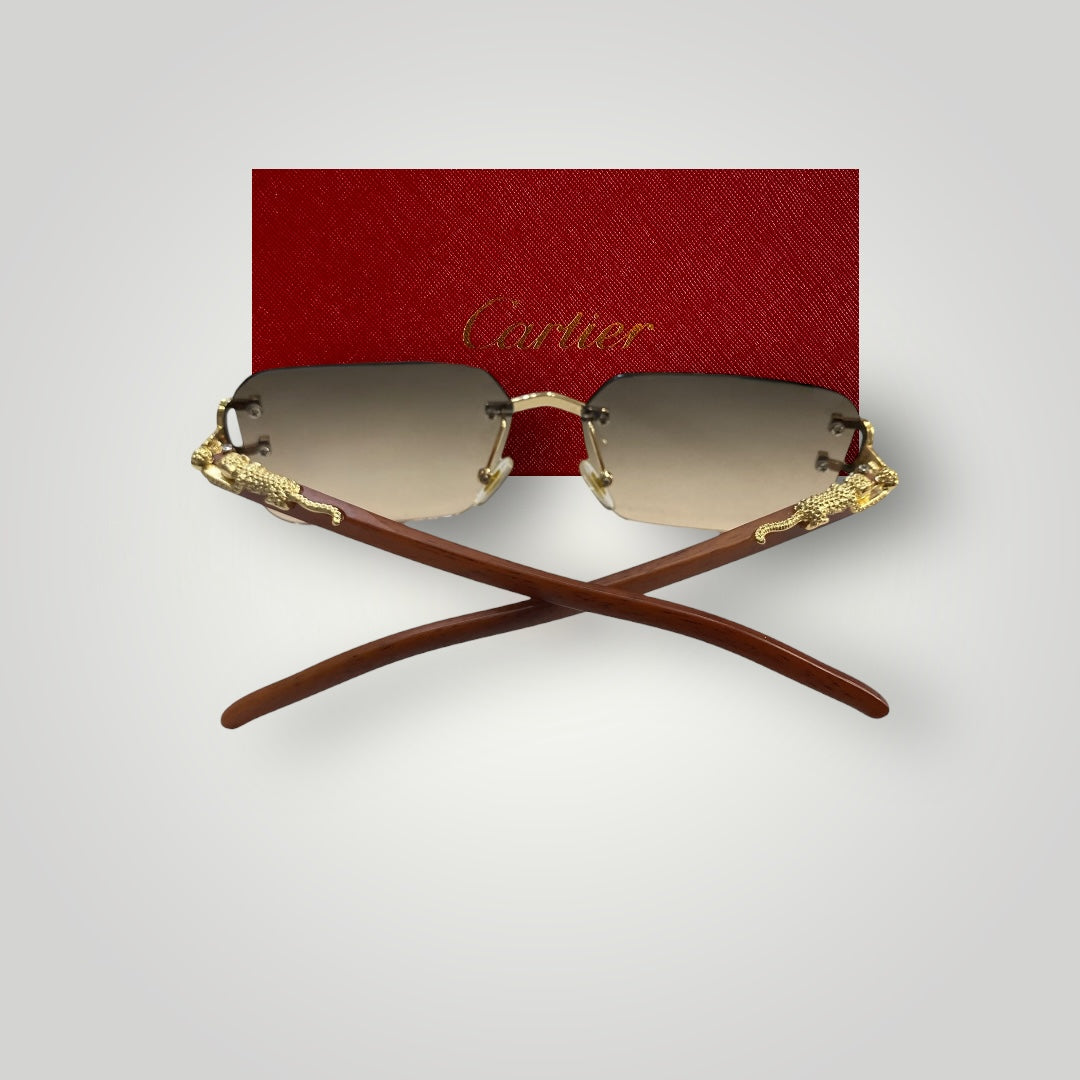 Premium men's sunglasses featuring sleek rimless design and elegant gold accents on bridge and arms