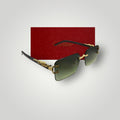 Close-up of premium Cartier rimless sunglasses with green lenses and gold dragon accents on temples  