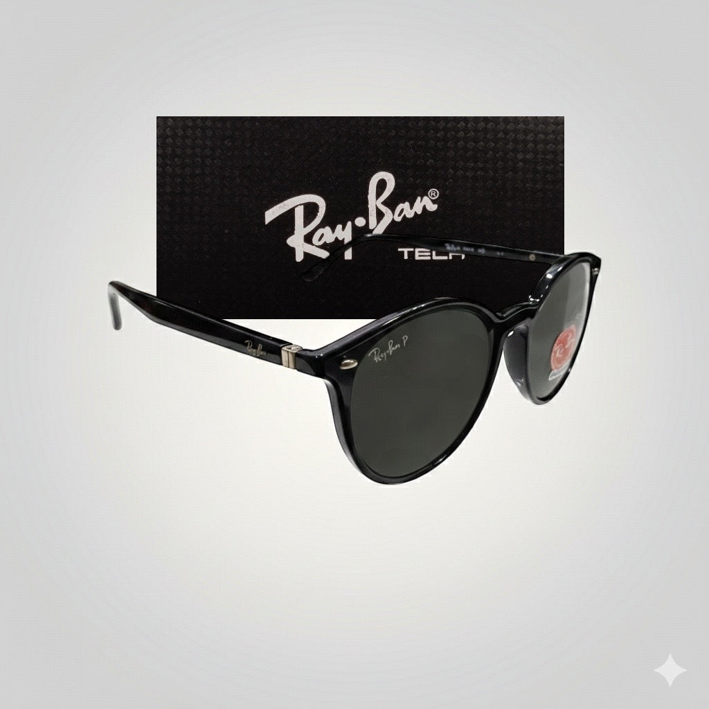 Side angled view of Ray-Ban polarized sunglasses with black acetate frame and dark lenses, positioned in front of a Ray-Ban Tech black textured box.