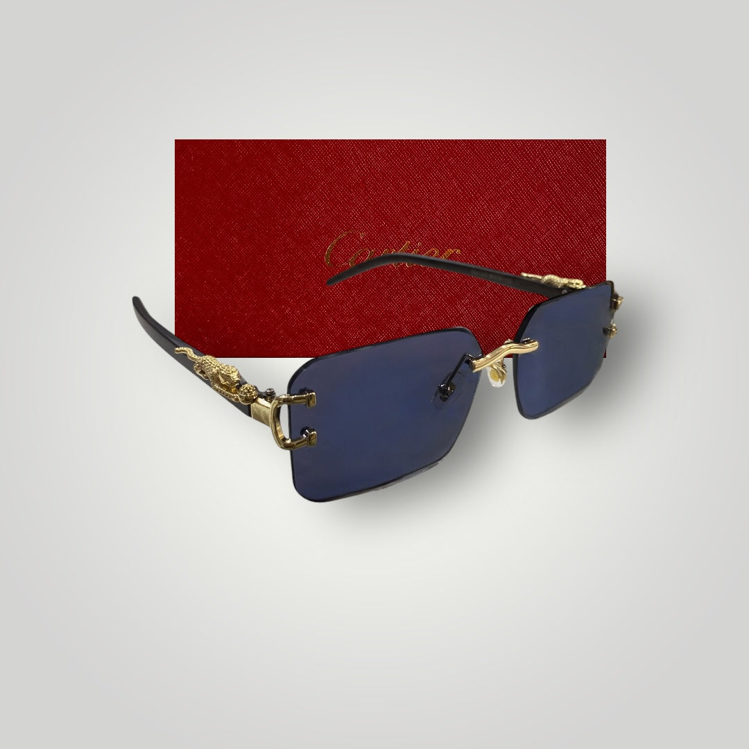 Side angle view of luxury rimless sunglasses with blue lenses and gold dragon detail on black temples