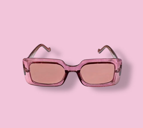Front view of Beenai Original 3003 women's sunglasses with pink transparent rectangular frame on a pink background