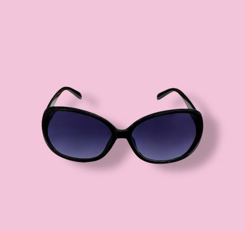 Front view of Beenai Original 3001 women's sunglasses with black frame and blue gradient lenses on pink background
